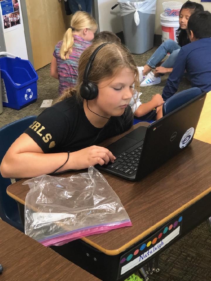 3rd grade student uses technology to practice math facts.